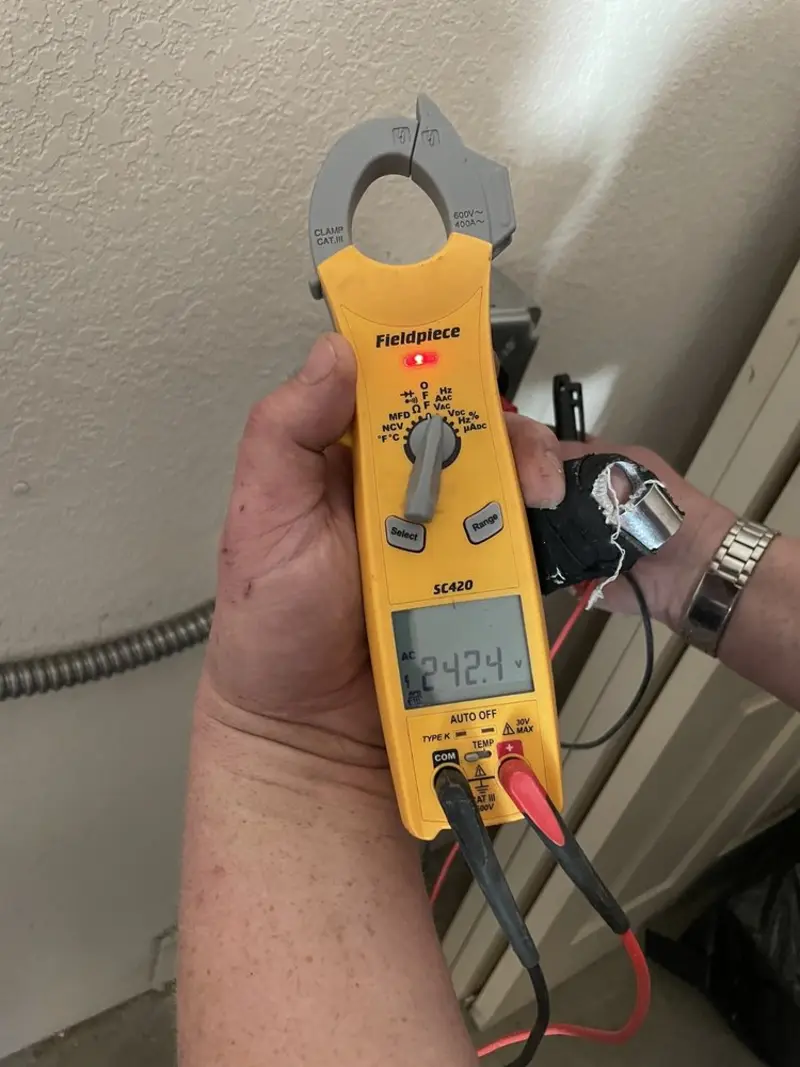 Voltage testing with clamp meter during Generator Installation in Elmira